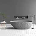 Round Gray Stone Bathtub in Modern Bathroom Interior with White Wooden Floor and Wall Niche