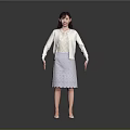 A Woman Standing In Gray Background Wearing White Cardigan And Lace Skirt With High Heels