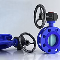 Two Blue Flange Valves With Black Wheel Handles Standing And Lying