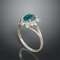 Elegant Silver Ring With Central Green Gemstone And Small Diamonds