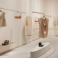 Minimalist Clothing Store Interior With Hanging Clothes Lingerie Mirror Display Stand And Accessories