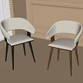 Modern Dining Chairs with Light Upholstered Seats and Contrasting Wooden Legs