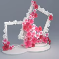 Interactive Area With White Carved Frames Pink Red Flowers Various Sizes And White Base 3d model