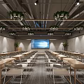 Modern Conference Room with Long Tables Chairs Large Screen Chandeliers and Plants