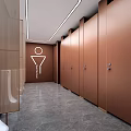 Modern Public Restroom Interior With Brown Stall Doors Gray Marble Floor And Gender Signs