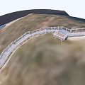 Scenic Winding Pedestrian Walkway With Safety Railings And Wooden Decking On Sloped Terrain