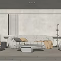 Modern Luxury Living Room Interior With White Sofa Round Coffee Table And Throw Blanket