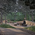 Outdoor Wooden Tables And Stone Chairs Surrounded By Trees Green Grass And Stone Walls