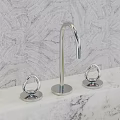 Different Style Faucets Displayed On Marble Countertop With Patterned Background 3d model