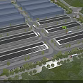 Aerial View of Industrial Factory Complex With Neatly Arranged Buildings Greenery Roads and Vehicles