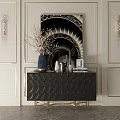 Black Scalloped Console Sideboard Gold Legs Decorated With Vase Books Candles On White Wall Artwork