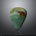 Polished Natural Wood Stone Teardrop Ornament With Green Red White Hues And Smooth Texture