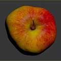 Fresh Red and Yellow Apple on Dark Glossy Surface with Vibrant Colors