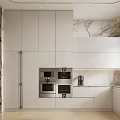 Modern Kitchen Interior With White Cabinets Marble Countertops And Built-in Ovens