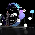 Speaker On Modern Event Stage With Round Decorations And Brand Logos