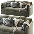 Luxurious Green Velvet Sectional Sofa With Multiple Decorative Pillows And Cozy Throw Blanket