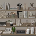 Elegant Decorative Ornament Collection On Shelf With Books Vases Plants Clock And Radio