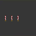 Red And White Striped Traffic Barriers With Yellow Bases Arranged In Different Shapes