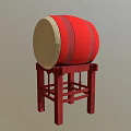 Traditional Red Drum Musical Instrument With Light Colored Head And Red Wooden Stand