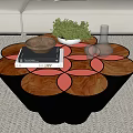 Modern Petal Shaped Coffee Table With Wooden Glass Top Bowl Books Vase And Sofa
