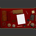Traditional Worktable With Red Tablecloth Golden Containers Scissors Notebook And Ink Bottle