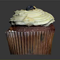 Delicious Red Cupcake With White Creamy Frosting Blueberry Topping And Textured Paper Liner