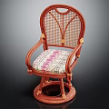 Brown Rattan Leisure Chair With Armrests Woven Backrest Round Base And Patterned Cushion