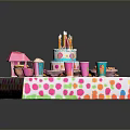 Colorful Birthday Party Food Display with Decorated Cake Candles Cups and Snacks