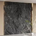 Dark Textured Stone Feature Wall In Modern Interior With Wooden Panel And Green Plant