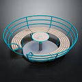 Circular Playground Equipment With Blue Railings And Wooden Benches Surrounding Central Round Table