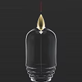 Transparent Ceramic Vessel With Golden Spire Top And Star Decoration On Black Background