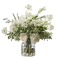 White Roses and Hydrangeas in Glass Vases with Green Leaves and Branches