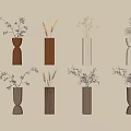 Minimalist Wall Decor With Various Shaped Vases Holding Dried Flowers On Beige Wall
