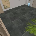Dark Modern Floor Tiles With Stone-like Texture In Indoor Setting With Green Plant