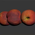 Fresh Red Peaches in a Pile on Dark Background with Shiny Skin