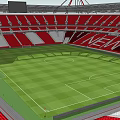 Football Stadium Surrounded by Red Running Track With Grandstand Floodlights Green Grass And Trees