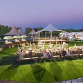 Scenic Camping Site With Tents Green Lawn And Outdoor Gathering Area