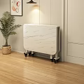 Folding Dining Table With Marble Pattern And Wheels On Wooden Floor Near Green Plant