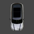 Silver Mini Cooper 3 Door Hatchback with Sporty Wheels and Round Headlights Design