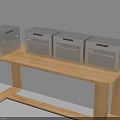 Four Silver Kitchen Appliances Placed On Wooden Table For Kitchen Use