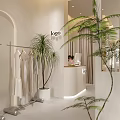 Modern Clothing Store Interior Design With Clothing Rack Sofa Floor Lamp And Wall Art