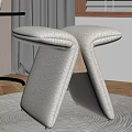 Beige Woven Stools On Wooden Floor With Metal Side Table And White Vase