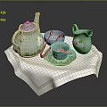Porcelain Tea Set With Pink Floral Design Teapot Creamer Cup Saucer On White Napkin