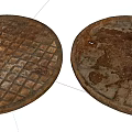 Road Infrastructure Circular Manhole Covers With Grid Pattern And Worn Stained Surface 3d model