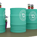 Interactive Zone With Green Barrels White Logos And Small Potted Plants 3d model
