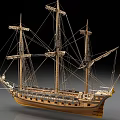 Detailed Wooden Vintage Sailing Ship Model With Multiple Masts And Intricate Rigging