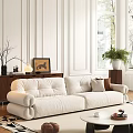 Modern White Sofa Coffee Table Set With Plush Pillows Wall Paneling In Bright Living Room