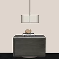 Modern Pendant Chandelier Hanging Above Dark Wood Cabinet With Marble Top And Decorative Sphere