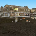 Old Brick Storefront Buildings With Vintage Signage And Utility Poles On Cobblestone Street