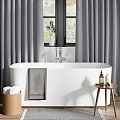 White Bathtub With Gray Curtains Window Potted Plant Gray Towel Wooden Table And Toiletries Basket